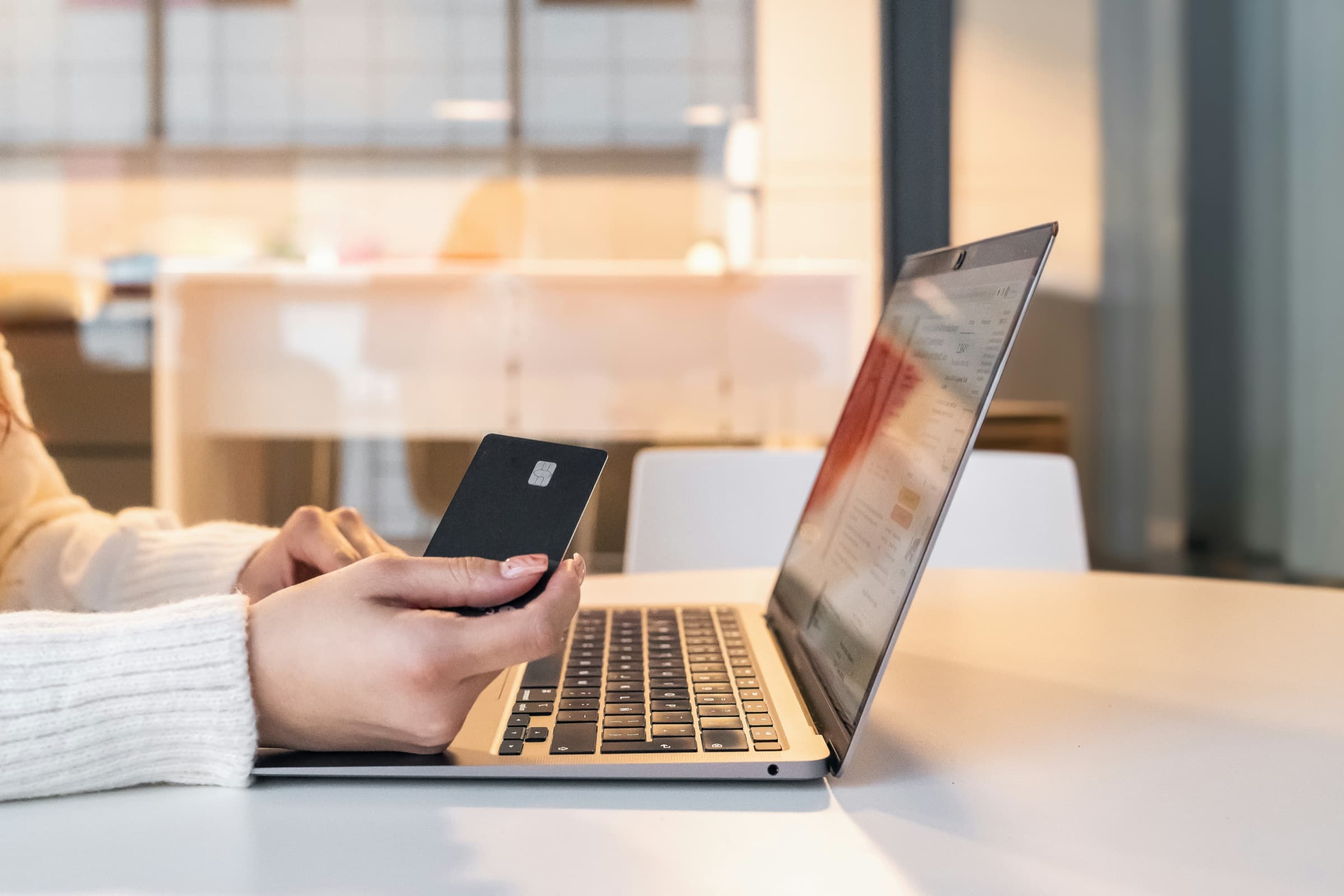 Online checkout on a laptop, representing New Nexus Group's Digital Commerce services