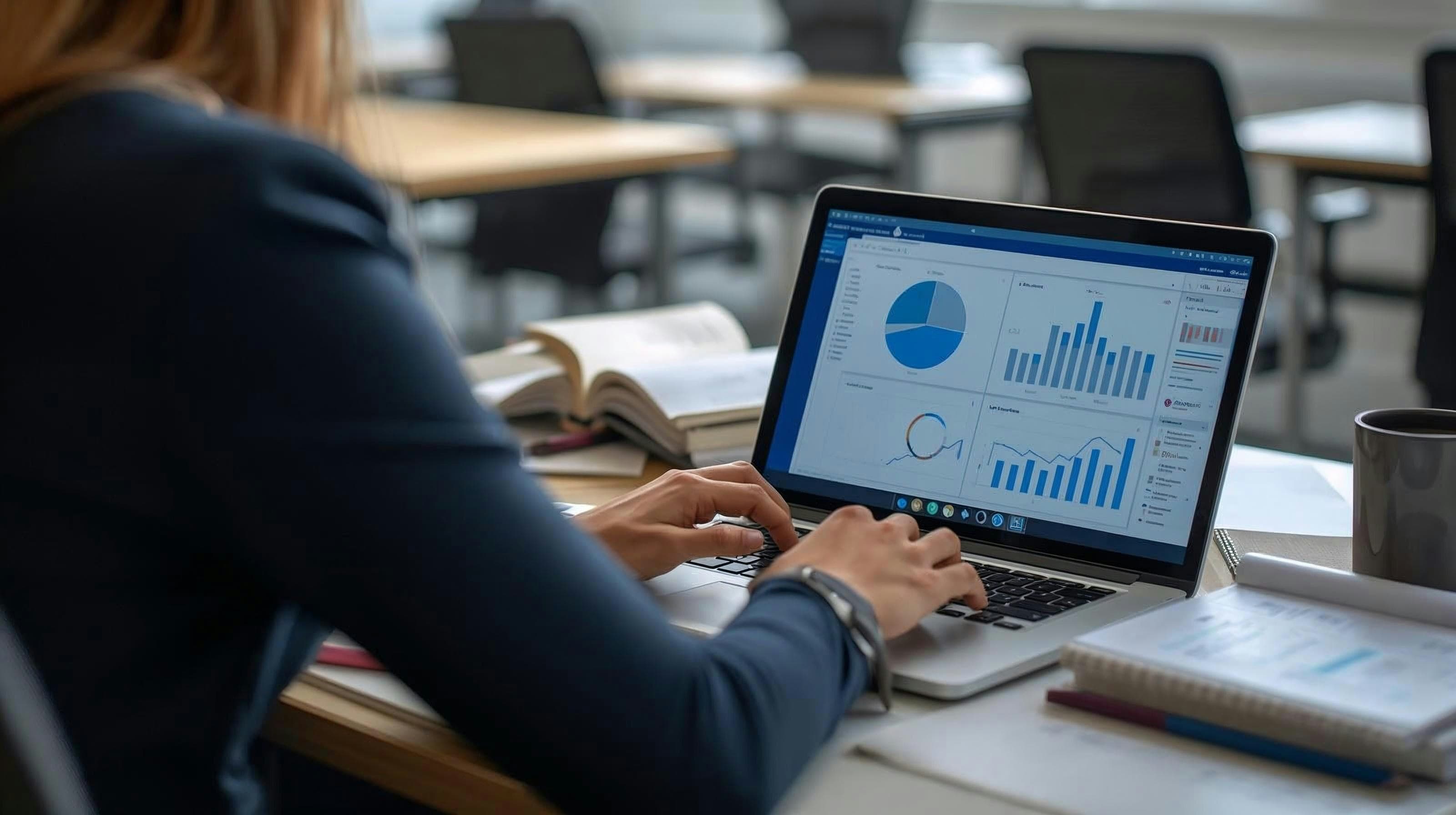 Team member reviewing retail analytics dashboard on a laptop